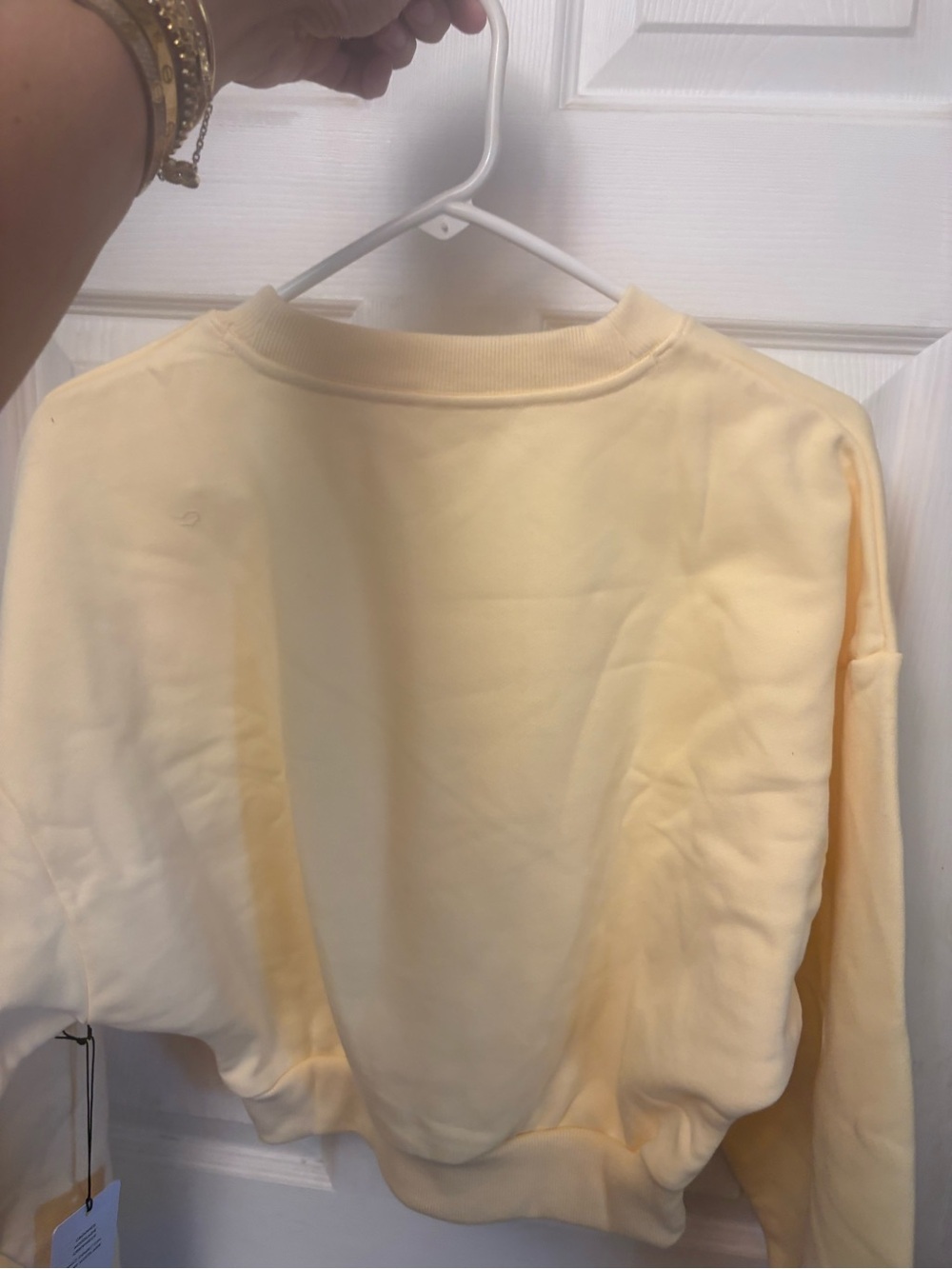 Alo Cropped Accolade Crewneck Sweatshirt in Soft Pale Yellow - Picture 2 of 7